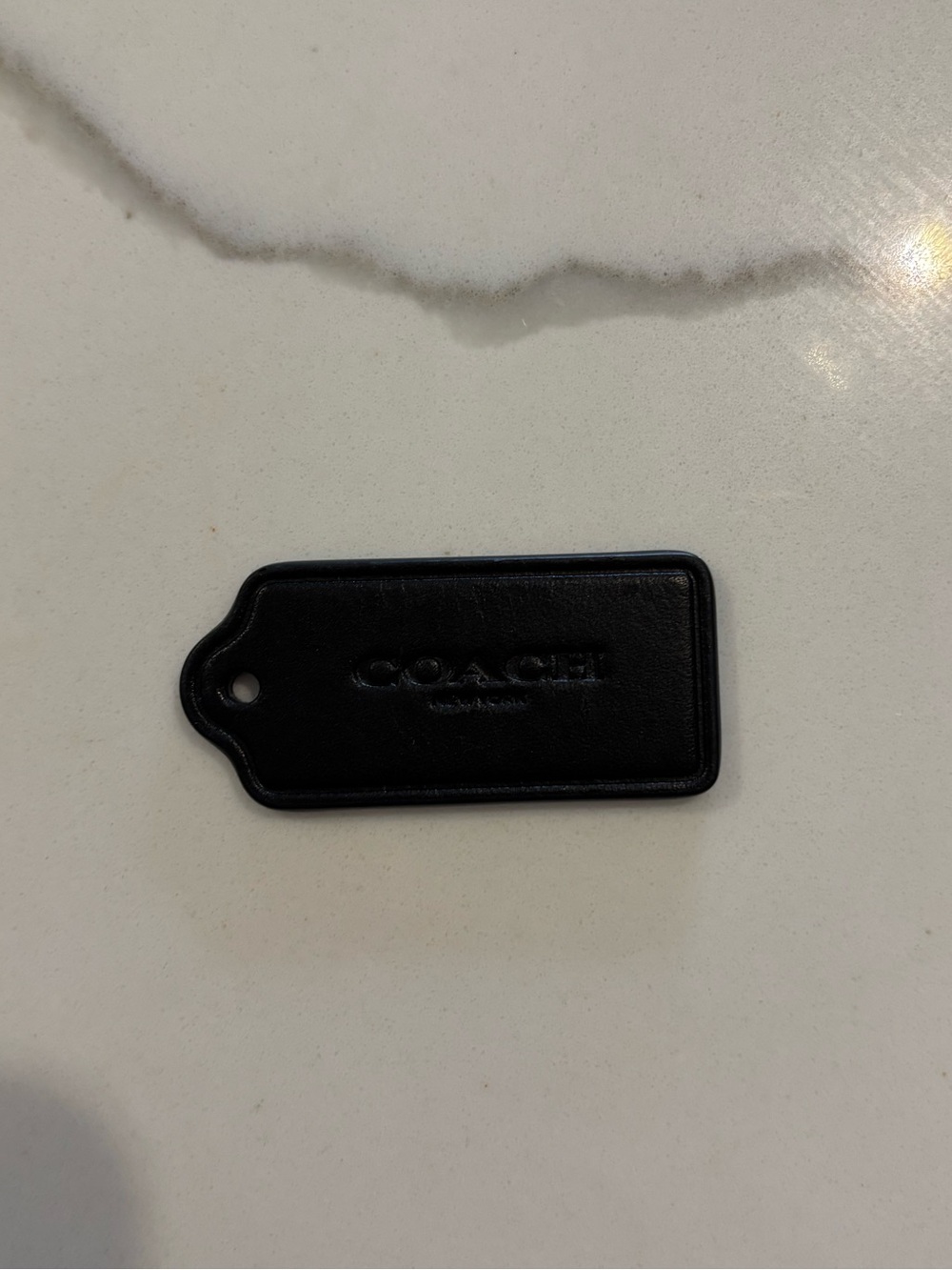 coach tag